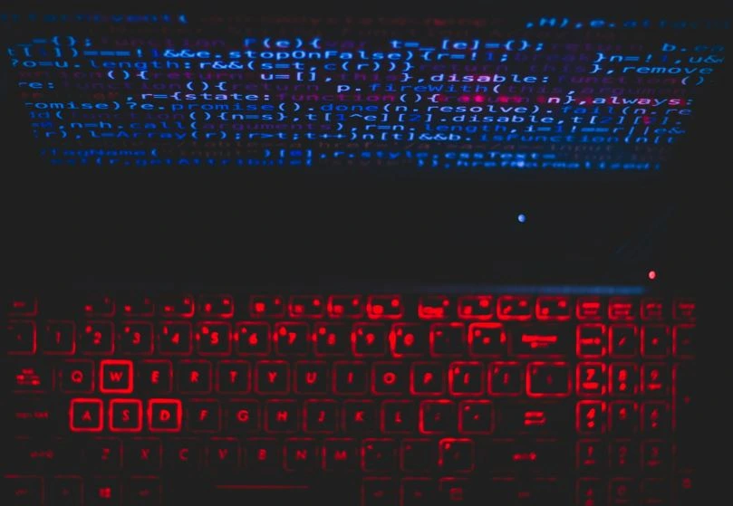 Blog image showing a green computer screen displaying computer codes zeros and ones